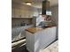 Bright kitchen features butcher block countertops, white cabinetry, and modern appliances at 3125 Colonial Way # H, Atlanta, GA 30341