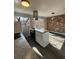 Modern kitchen island with butcher block countertop and new appliances at 3125 Colonial Way # H, Atlanta, GA 30341