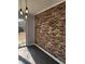 Modern living room with a brick wall and new flooring at 3125 Colonial Way # H, Atlanta, GA 30341