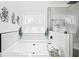 Soaking tub with modern design and decor, and glass shower at 1514 Park Grove Dr, Lawrenceville, GA 30046
