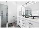 Contemporary bathroom with a glass shower and double sink vanity with white cabinets at 1514 Park Grove Dr, Lawrenceville, GA 30046