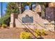 Community sign that reads The Park At Old Norcross framed by brick pillars and trees at 1514 Park Grove Dr, Lawrenceville, GA 30046