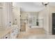 Elegant bathroom featuring a soaking tub, glass shower, and white cabinetry at 1525 Thomas Rd, Canton, GA 30115