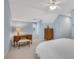 A bedroom with neutral carpet, light blue walls, and a window with blinds allowing for natural light at 1525 Thomas Rd, Canton, GA 30115