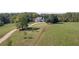 Beautiful home on expansive property, accessed by a long winding driveway at 1525 Thomas Rd, Canton, GA 30115