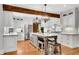 Beautiful kitchen featuring stainless appliances, a large island with barstools, and custom cabinetry at 1525 Thomas Rd, Canton, GA 30115