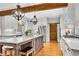 Bright and modern kitchen showcasing a center island, granite countertops, and stainless steel appliances at 1525 Thomas Rd, Canton, GA 30115