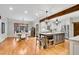 Open kitchen with stainless appliances, large island with seating, and adjacent breakfast nook at 1525 Thomas Rd, Canton, GA 30115