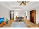 Home office with stylish decor, ceiling fan, hardwood floors and ample space for productivity at 1525 Thomas Rd, Canton, GA 30115