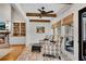 Bright sunroom with brick floors, exposed beams, a fireplace and backyard views at 1525 Thomas Rd, Canton, GA 30115