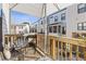 Inviting outdoor balcony with seating and views of the neighborhood offers a relaxing retreat at 1756 Morningtide Ne Ln, Atlanta, GA 30324