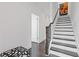 Entryway staircase with hardwood floors and white risers, leading to upper levels at 1756 Morningtide Ne Ln, Atlanta, GA 30324