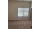 Bright bedroom with natural light, plush carpet, and blinds-covered window at 1857 Kingsmere Run Dr, Loganville, GA 30052