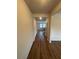 Entryway with wood-look flooring leading to other rooms in the home at 1857 Kingsmere Run Dr, Loganville, GA 30052