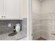 Kitchen pantry featuring wire shelving and ample storage space at 1857 Kingsmere Run Dr, Loganville, GA 30052