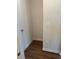 Small storage area with hardwood floors, perfect for pantry or utility use at 1857 Kingsmere Run Dr, Loganville, GA 30052