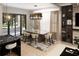Bright dining room features stylish chandelier, marble table, and elegant decor at 4250 Carmain Ne Dr, Atlanta, GA 30342