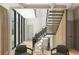 Bright entryway with a modern staircase, high ceilings, and large windows providing ample natural light at 4250 Carmain Ne Dr, Atlanta, GA 30342