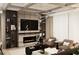 Cozy living room features a modern fireplace, built-in shelving, and comfortable seating at 4250 Carmain Ne Dr, Atlanta, GA 30342