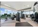Well-equipped gym with modern exercise machines and floor-to-ceiling windows offering scenic views at 3630 Peachtree Ne Rd # 1809, Atlanta, GA 30326