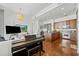 Bright open concept living area features a kitchen and a piano at 3630 Peachtree Ne Rd # 1809, Atlanta, GA 30326