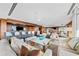 Open-concept living room with a bar area, comfortable seating, and stylish decor with city views at 3630 Peachtree Ne Rd # 1809, Atlanta, GA 30326