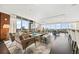 Spacious living room with floor-to-ceiling windows, hardwood floors, and stylish contemporary decor at 3630 Peachtree Ne Rd # 1809, Atlanta, GA 30326