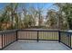 View from a deck with black railing overlooking an expansive yard at 1013 Columbia Dr, Decatur, GA 30030