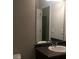 Bright bathroom featuring a large mirror and a functional sink at 266 Valley Xing, Canton, GA 30114