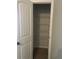 Bright pantry closet with an open door and wire shelving at 266 Valley Xing, Canton, GA 30114