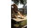 Community playground area featuring a playhouse with a slide and swings at 266 Valley Xing, Canton, GA 30114