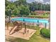 A sparkling community pool with playground at 266 Valley Xing, Canton, GA 30114