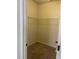 An empty walk-in closet with a wire shelf for easy storage at 266 Valley Xing, Canton, GA 30114