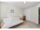 Bedroom featuring a white futon, a window and a beige carpet at 3782 Chattahoochee Summit Se Dr, Atlanta, GA 30339
