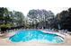 Resort-style community pool with ample seating, perfect for relaxation and socializing at 3782 Chattahoochee Summit Se Dr, Atlanta, GA 30339