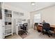 Inviting home office area with built-in shelving and desk, perfect for remote work or study at 3782 Chattahoochee Summit Se Dr, Atlanta, GA 30339