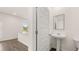 Stylish bathroom with a stand sink and natural light at 300 Halibut Circle Cir, Covington, GA 30016