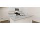 Kitchen with granite countertops, stainless steel appliances, and a kitchen island at 300 Halibut Circle Cir, Covington, GA 30016