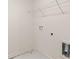 A laundry room with white walls, shelving and utility hookups at 300 Halibut Circle Cir, Covington, GA 30016