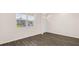 Open-concept living space showcasing hardwood floors and a ceiling fan at 300 Halibut Circle Cir, Covington, GA 30016