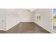 Open-concept space with large window and access to the backyard at 300 Halibut Circle Cir, Covington, GA 30016