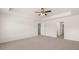 Spacious carpeted main bedroom features a trey ceiling and open doorway at 300 Halibut Circle Cir, Covington, GA 30016