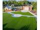 Aerial view of amphitheater and park featuring lush green lawns and modern design elements at 1977 American Way # 30, Kennesaw, GA 30144
