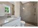 Bathroom with a granite countertop, glass shower, and silver hardware at 1977 American Way # 30, Kennesaw, GA 30144
