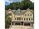 Elegant townhome with attached garage offers modern living in a beautifully designed community at 1977 American Way # 30, Kennesaw, GA 30144