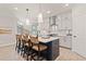 Well-lit kitchen with an island with seating and modern appliances at 1977 American Way # 30, Kennesaw, GA 30144