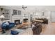 Open-concept living room featuring a fireplace, built-in shelves, and modern decor at 1977 American Way # 30, Kennesaw, GA 30144