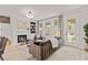 Bright living room with fireplace, and backyard access at 1977 American Way # 30, Kennesaw, GA 30144