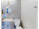 This bathroom features a vanity with storage and a toilet at 1181 Church St # G, Decatur, GA 30030