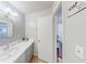 This bathroom features a vanity with storage and a decorative mirror at 1181 Church St # G, Decatur, GA 30030